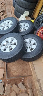 A set of 15inch Toyota hilux D4D mags and tyres for sale