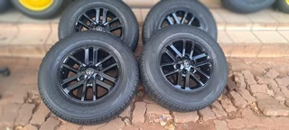 A set of 17inch Toyota hilux mags and tyres like new