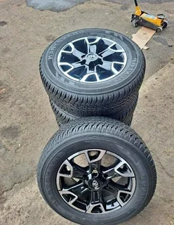 A set of 18 inch legend 50 mags and tyres.   rims are like new