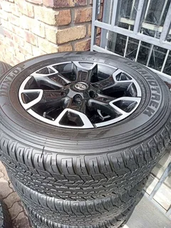 A set of 18 inch legend 50 mags and tyres.   rims are like new