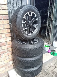 A set of 18 inch legend 50 mags and tyres.   rims are like new
