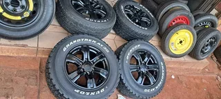Set of 17 inch Ford Ranger mags and tyres