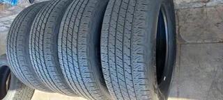 A set of 255/65/18 Goodyear wrangler.  90% thread life