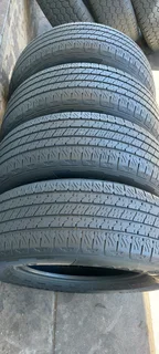 A set of 255/65/18 Goodyear wrangler.  90% thread life