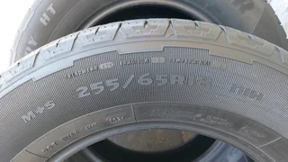 A set of 255/65/18 Goodyear wrangler.  90% thread life
