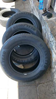 A set of 255/65/18 Goodyear wrangler.  90% thread life