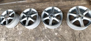 15inch toyota run x rims . Grey colour