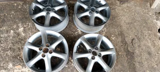 15inch toyota run x rims . Grey colour