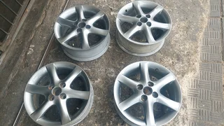 15inch toyota run x rims . Grey colour