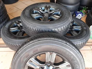 A  set of 17inch gd6 mags and good secondhand tyres