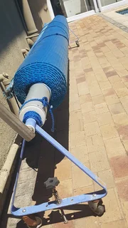 Roll-up Pool Cover - with heavy-duty alluminium roller bracket. R1000 neg.