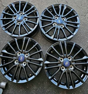 15-inch original gloss black Ford Fiesta mags (4x108 PCD)