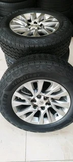 18inch Toyota Fortuner/Landcruiser original original mags with 255/65R18 Goodyear wrangler territory