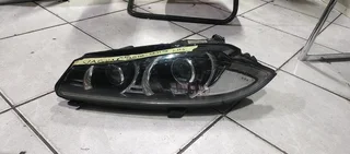JAGUAR XF HEADLIGHT 2015
