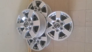 Nissan Np300 hardbody 16 inch mag rims. Leave your whatsapp number if interested.