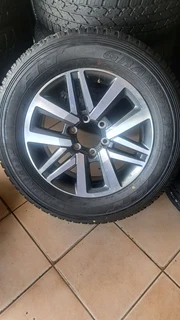 One 18 inch toyota mags with brand new tire for sale tires and rims for sale.