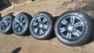 17 inch toyota mags with 265 65 r17, 95% thread left, dunlop grandtrek.