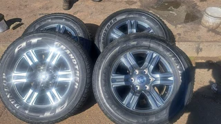17 inch toyota mags with 265 65 r17, 95% thread left, dunlop grandtrek.