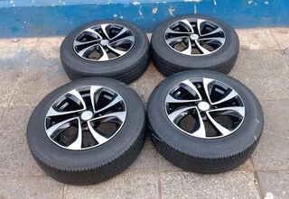 A set of 16 inch Suzuki mags with 195/55R16 Bridgestone tires.