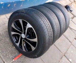 A set of 16 inch Suzuki mags with 195/55R16 Bridgestone tires.
