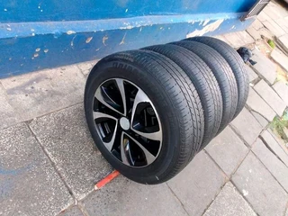 A set of 16 inch Suzuki mags with 195/55R16 Bridgestone tires.