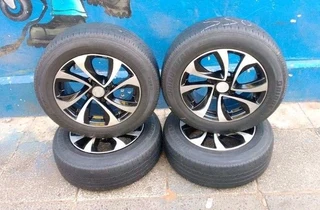 A set of 16 inch Suzuki mags with 195/55R16 Bridgestone tires.