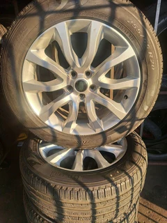A set of Land Rover mags and 255/55R20 tires. leave your whatsapp number if interested.