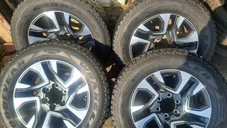 18 inch Toyota mags with 265/60R18 General Grabber tires leave me your whatsapp number if interested
