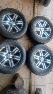 265/65R17 Toyota mags and bridgestone tires, leave your whatsapp number if interested.