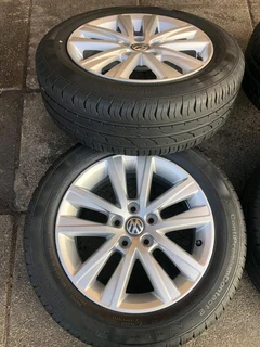 15 inch polo mags with 185 60 r15 continental tires. leave your whatsapp number if interested.
