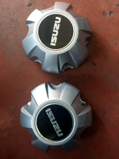 black/silver Isuzu D-max center caps available. Leave your whatsapp number if interested.