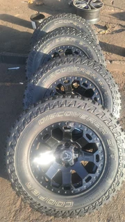 285/70R17 cooper discoverer tires with bakkie mags, leave your whatsapp number if interested.