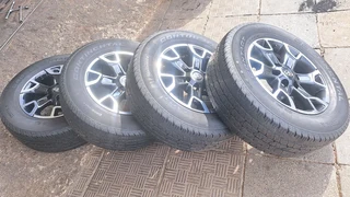 Toyota legend 50 mags with 265/65R18 continental tires, leave your whatsapp number if interested