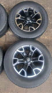 Toyota legend 50 mags with 265/65R18 continental tires, leave your whatsapp number if interested