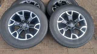 Toyota legend 50 mags with 265/65R18 continental tires, leave your whatsapp number if interested