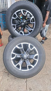 Toyota legend 50 mags with 265/65R18 continental tires, leave your whatsapp number if interested