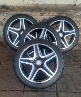 Original 19 inch AMG Mercedes mags and 235/45R19 Bridgestone tires. leave your whatsapp number