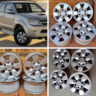 15 inch Toyota Hilux OEM mag wheels 4 sale. Leave your whatsapp number if interested.