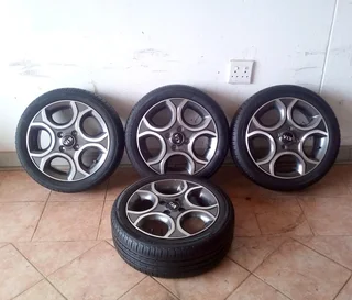  15-inch kia mag rims with 175/65R15 tires. Call/WhatsApp 0️⃣7️⃣3️⃣3️⃣0️⃣7️⃣6️⃣1️⃣6️⃣5️⃣