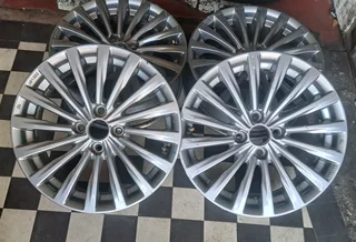 16-inch Toyota mag rims,  4x100 pcd. Leave your whatsapp number if interested.
