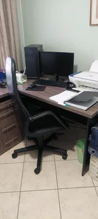 Computer with office desk and chair