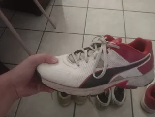 Golf club and cricket shoes