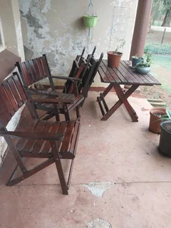 Patio set, with 4 fold up chairs R800. Springs
