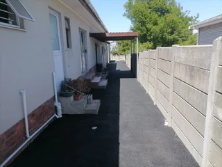 TAR ROAD AND ASPHALT DRIVEWAY