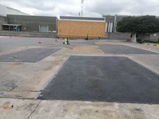 TAR ROAD AND ASPHALT DRIVEWAY