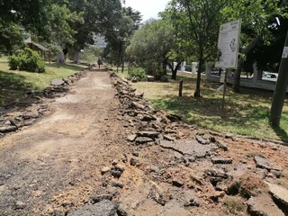 Asphalt tar surfacing and paving