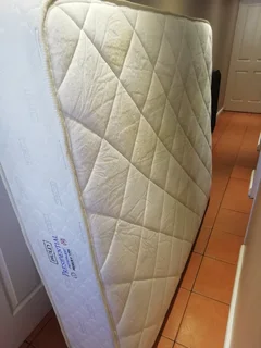 Queen size bed. Includes mattress base, headboard and pedastals