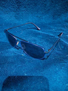 Blue rimmed aviator sunglasses and case