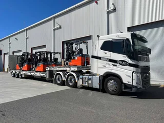 Low bed/low loader transport available 24/7--local/cross border