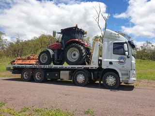 Transporting tractors/machinery 24/7--local/cross border/negotiable rates